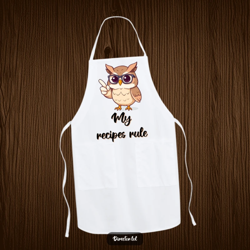 Funny Apron: Proud owl wearing glasses directing an imaginary stage, bringing theatrical flair to the kitchen.
