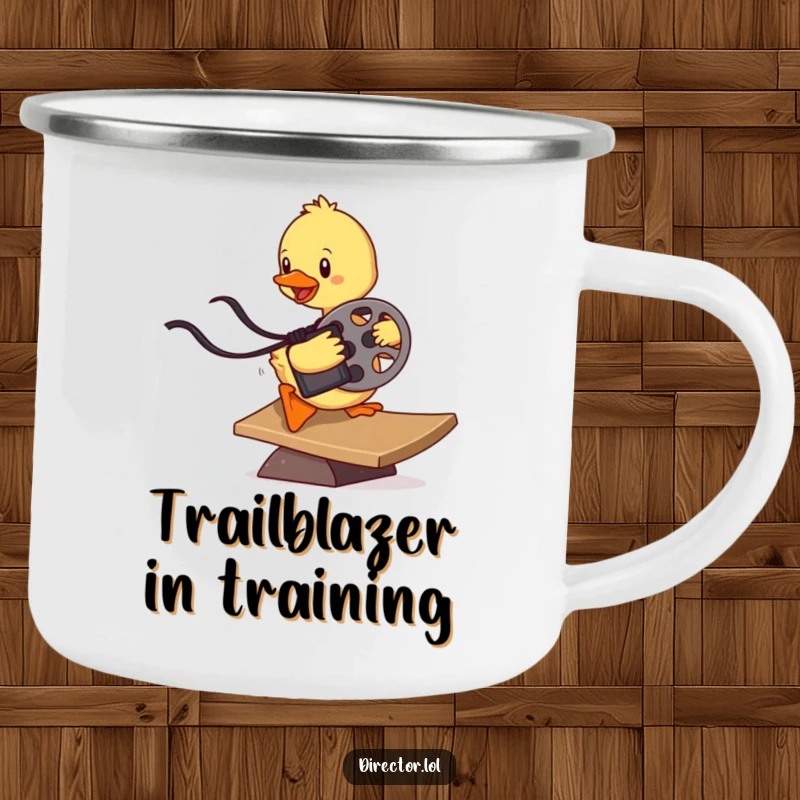 Funny determined duckling sliding down a ramp holding a film reel, a durable enamel camping mug for outdoor movie lovers.