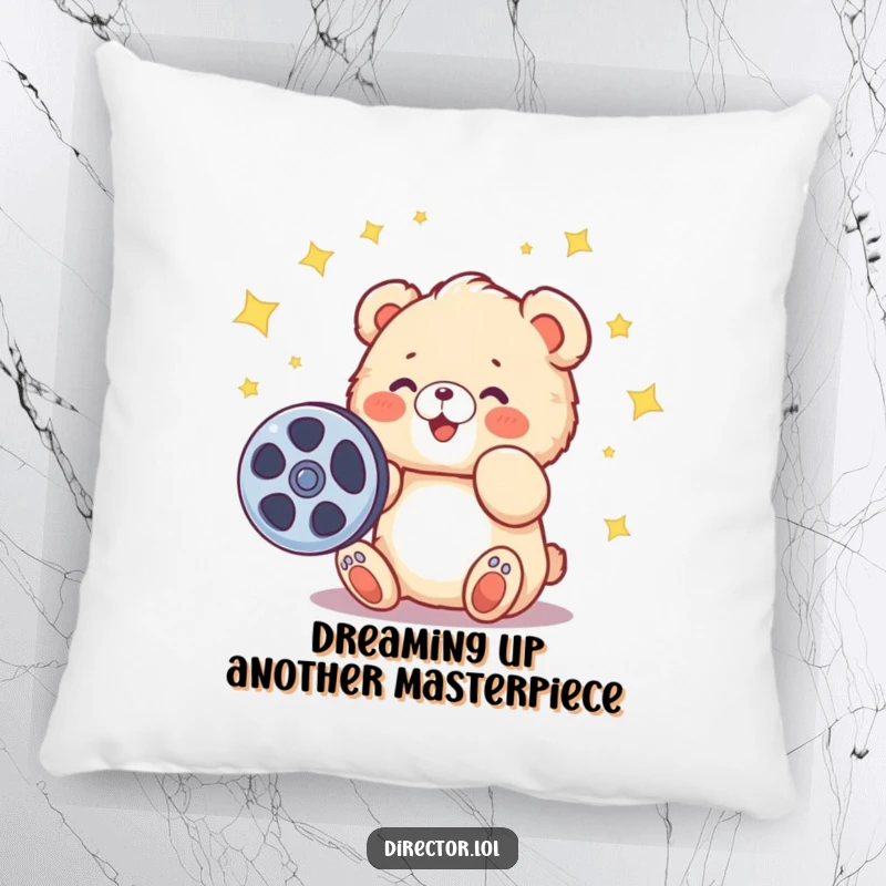 Funny pillow with a fluffy cartoon bear cub spinning a film reel, stars decorating the scene, adding cozy charm.