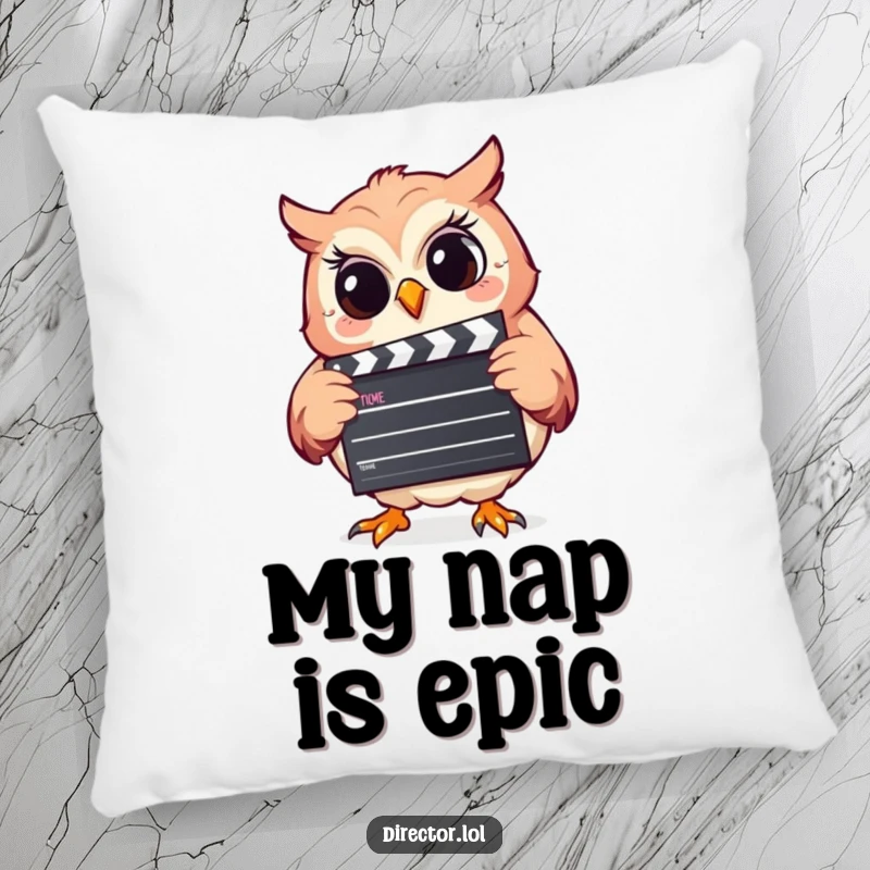 Funny pillow adorned with a giggling owl holding a clapperboard, offering both comfort and a visual gag for a playful atmosphere.
