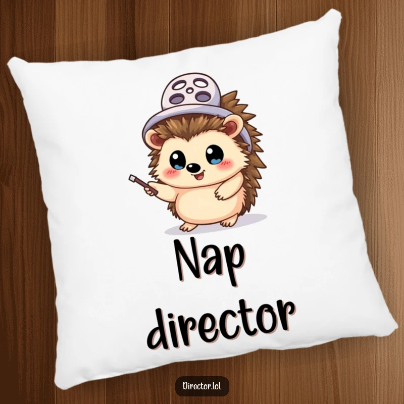Funny hedgehog director pillow, soft and decorative, a cheerful hedgehog in a film reel hat, waving a pointer stick with wide, director's eyes.