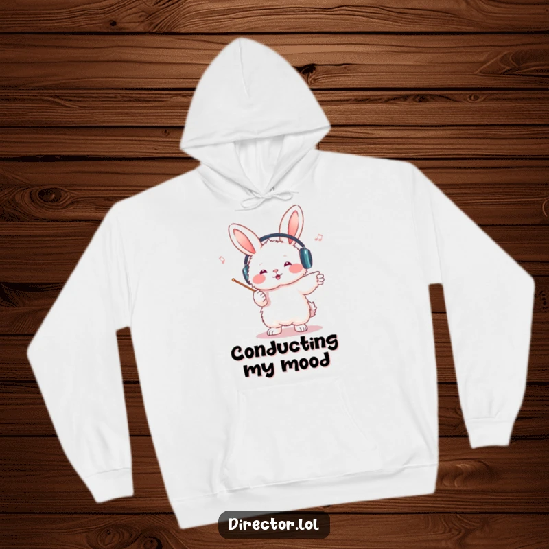 Funny bunny conductor hoodie, cozy and warm, headphones on, leading an imaginary orchestra with a tiny baton, a humorous and musical depiction.