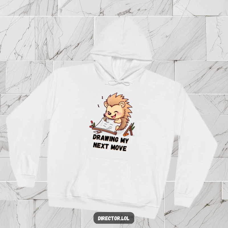 Funny determined hedgehog drawing furiously on a storyboard with a cheerful smile on this warm and cozy hoodie.