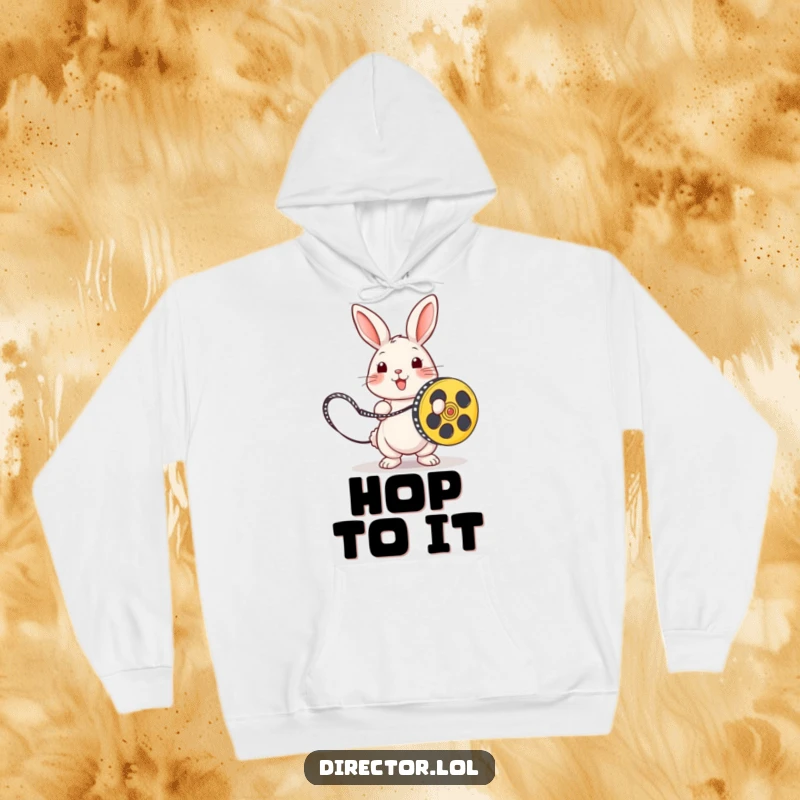 Funny playful rabbit skipping with a film reel, a humorous movie theme on a cozy hoodie.