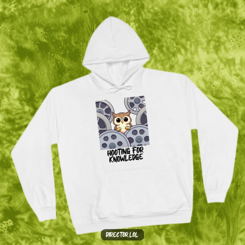 Funny Hoodie featuring a happy, curious owl perched above enormous film reels, offering warmth and a humorous nod to the magic of cinema.