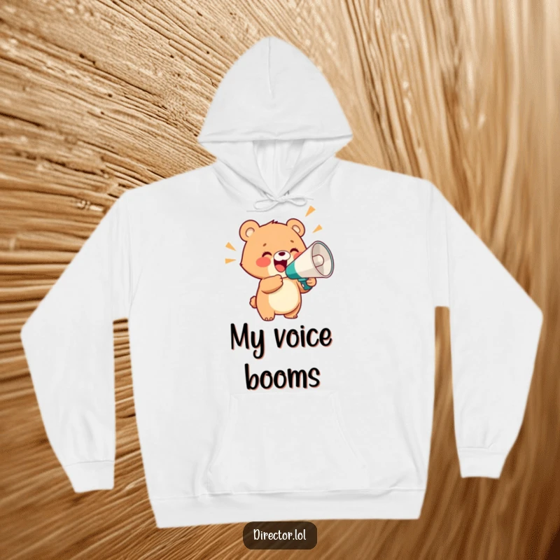Funny hoodie featuring a delighted bear cub holding a giant megaphone and shouting with glee, offering cozy comfort and loud cheer.