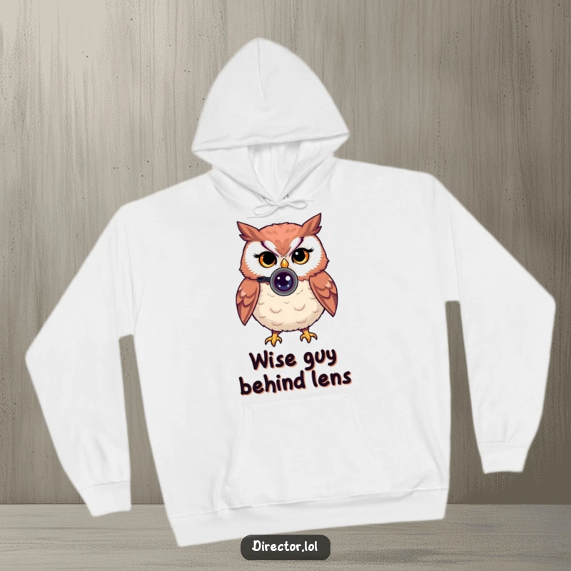 Funny hoodie with a proud owl peering through a tiny camera lens, giving a knowing wink, ideal for photographers.