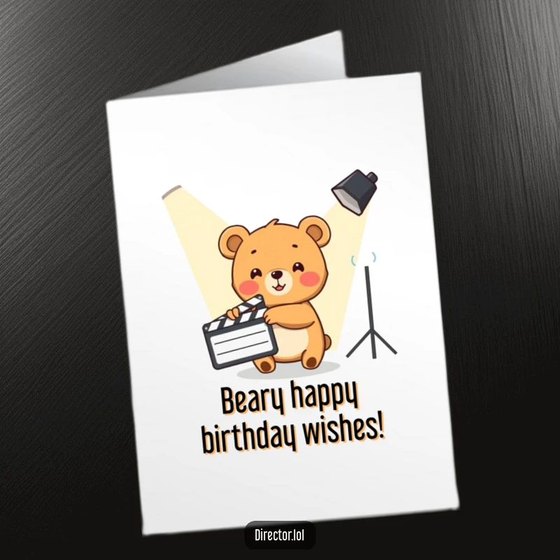 Funny Free Printable Birthday Card: Cute bear cub enthusiastically points with a clapboard towards a spotlight, celebrating a birthday.