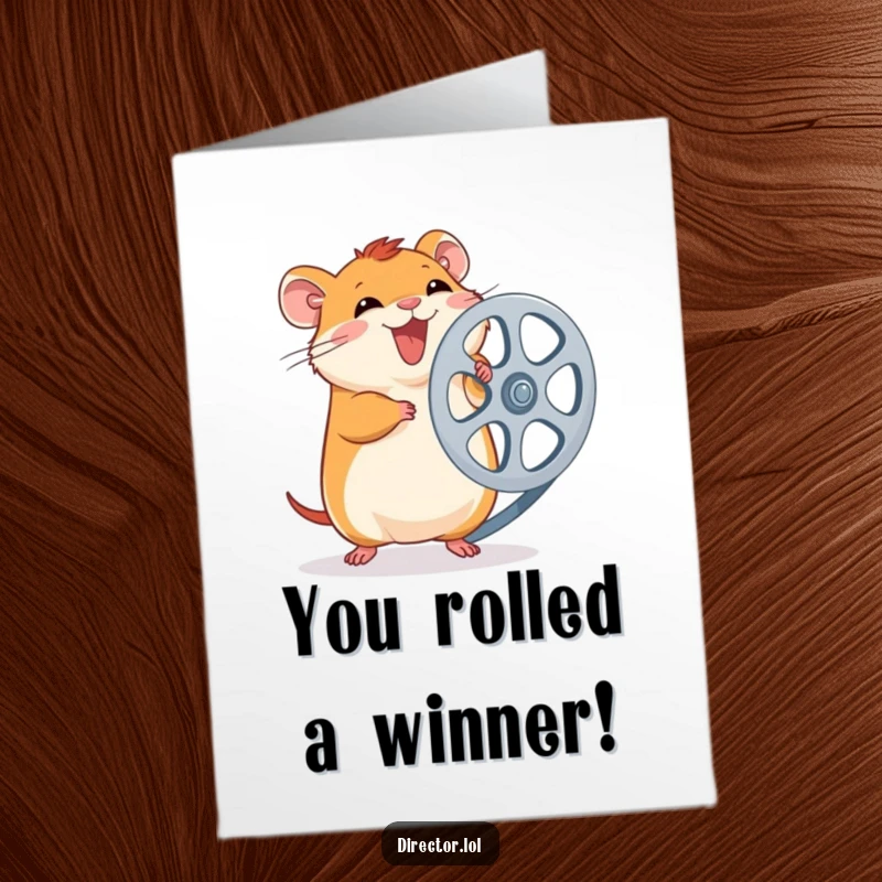 Funny Free Printable Congrats Card: Excited hamster spins a large film reel, celebrating a successful debut or project.