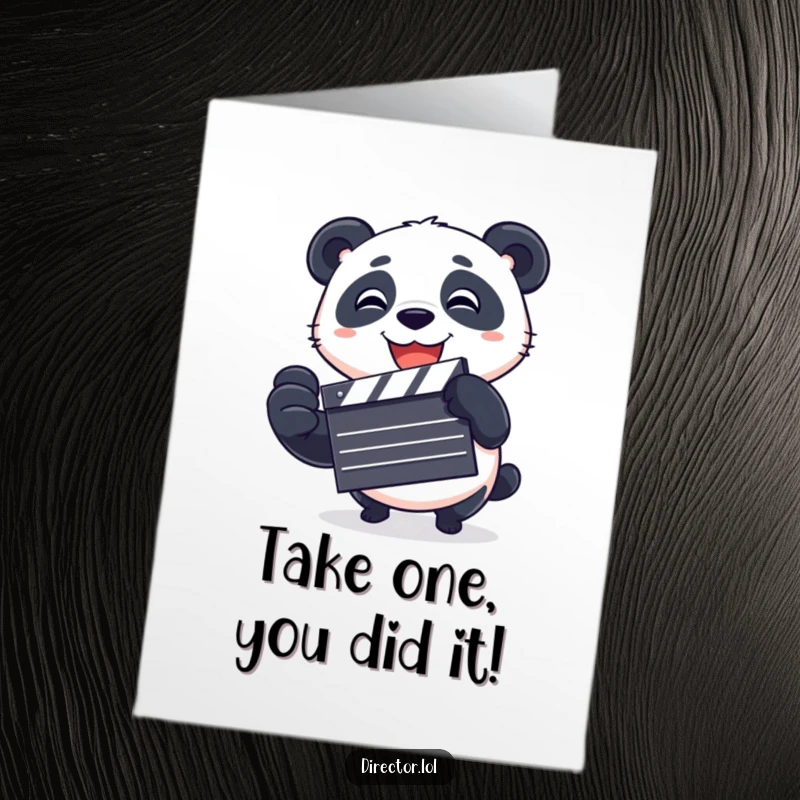 Funny free printable congratulations card: a playful panda grinning widely while spinning a film clapboard.