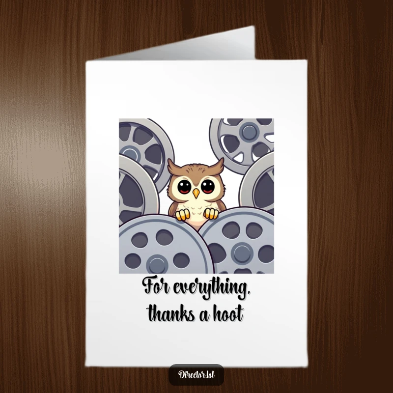 Funny free printable thank you card: a happy owl peeking over large film reels to say thanks warmly.