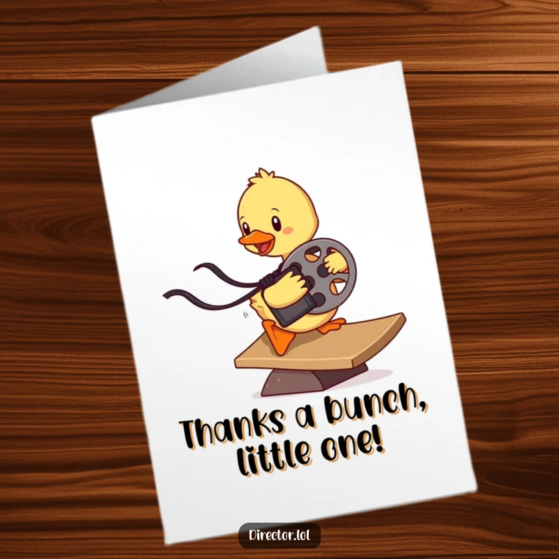 Funny Free Printable Duckling Thank You Card: Determined duckling sliding with a film reel, expressing thanks in a comical manner.