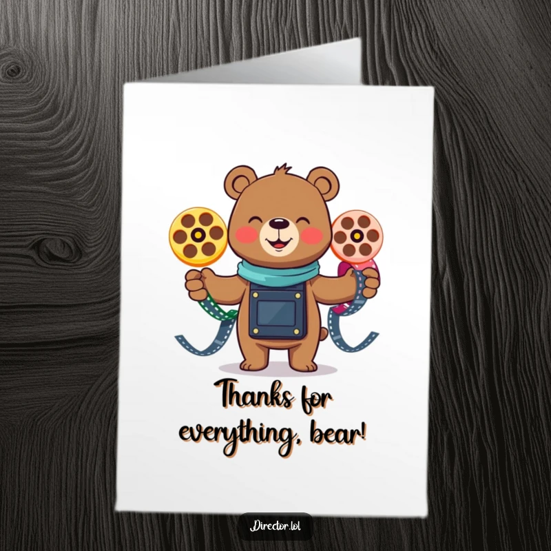 Funny Free Printable Bear Thank You Card: Smiling bear juggling colorful film reels, conveying thanks with playful energy.