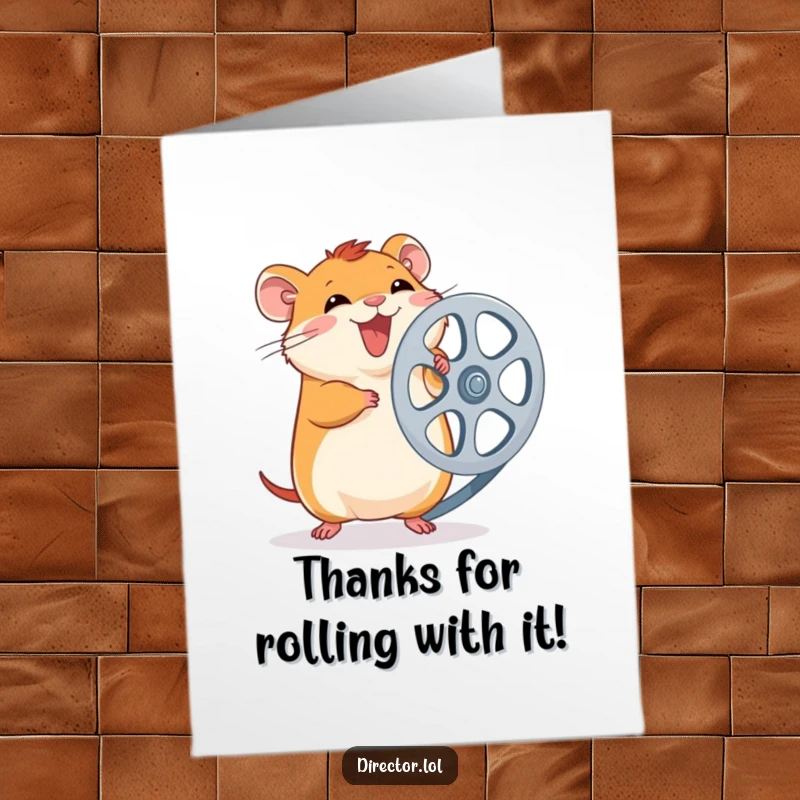 Funny Free Printable Thank You Card: Giggling hamster excitedly spins a large film reel, sharing gratitude with a smile.