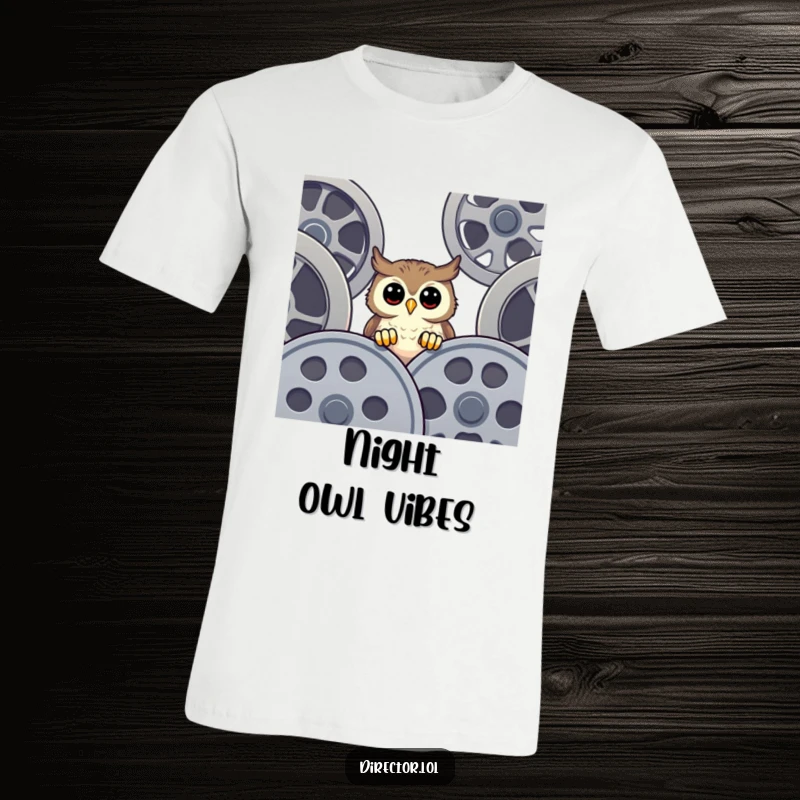 Funny T-Shirt with a happy owl with a curious expression, peeking over oversized vintage film reels, celebrating cinematic exploration with humor.