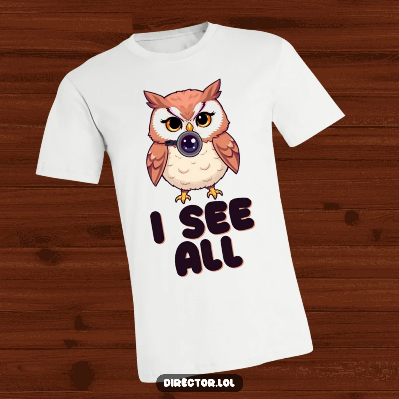 Funny t-shirt with a proud owl looking through a small camera lens, giving a knowing wink, ready to shoot.