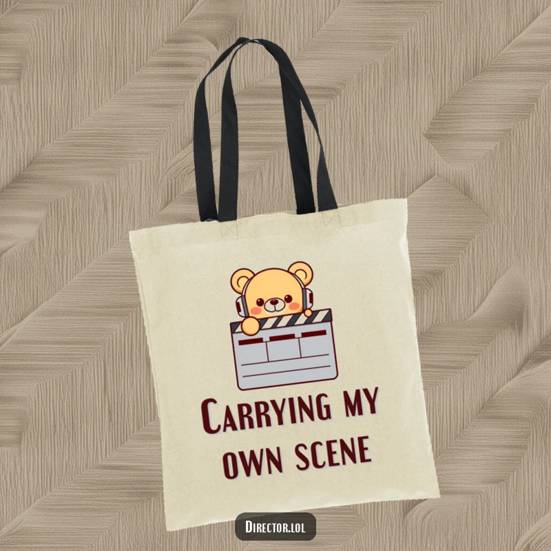 Funny Bear Director Tote Bag: Tiny smiling bear wearing headphones enthusiastically gestures towards a large clapperboard, a humorous and practical accessory.