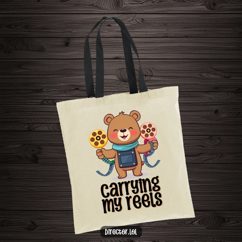 Funny smiling bear joyfully juggling three colorful film reels, a humorous and practical tote bag for movie lovers and fans of juggling.